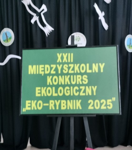 Zdjęcie przedstawia afisz na którym widnieje napis z tytułem konkursu: XXII Międzyszkolny Konkurs Ekologiczny  Eko-Rybnik 2025